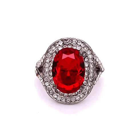 A big red synthetic ruby ring captured using the GemLightbox, iPhone, and GemLightbox turntable.